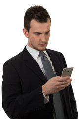 Young business man holding phone