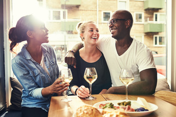 Fototapeta na wymiar Multi racial couple out dining