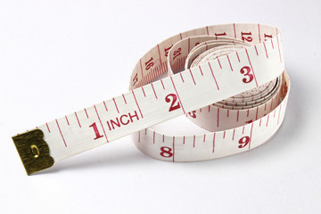 Measuring tape on white background