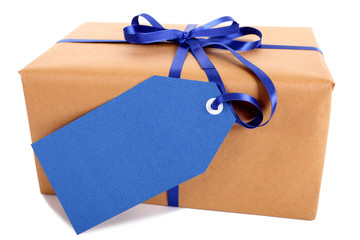 One single small brown paper wrapped package gift or parcel blue gift tag or label isolated on...