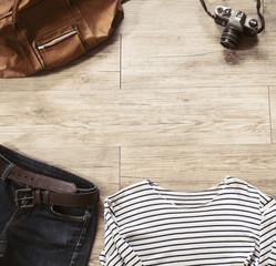 Vintage clothing and accessories on the wooden floor