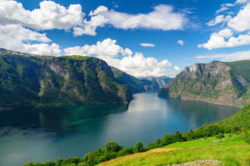 Naklejka na ściany i meble Aurlandsfjord against scenic blue sky, Norway