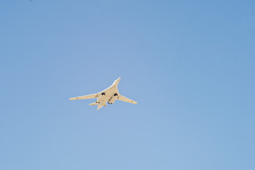 Tupolev Tu-160M (Blackjack) supersonic, variable-sweep wing heavy strategic bomber flies on blue sky background