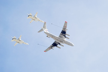 Ilyushin Il-78 (Midas) four-engined aerial tanker demonstrates refueling of 2 Sukhoi Su-24 (Fencer)...