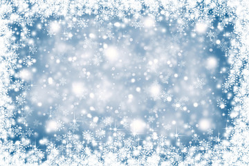 Blurry blue color abstract snowflakes. Christmas background