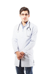 Young doctor arab is standing on the white background