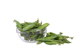 Fresh garden peas in a glass bowl.