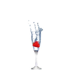 Strawberry splash in a cocktail glass on white