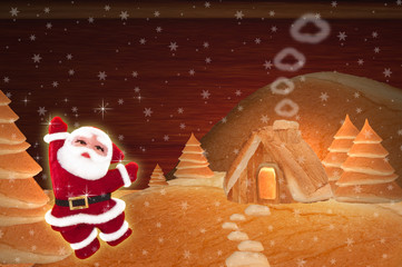 Christmas bread house and Santa Claus with festive decoration