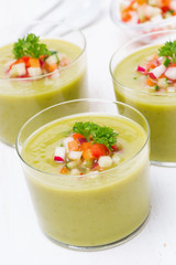 green soup with fresh vegetables, vertical
