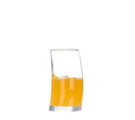 orange juice pouring into glass