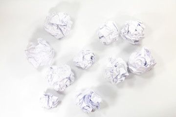 white paper balls on gray background ,top view