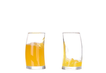 orange juice pouring into glass