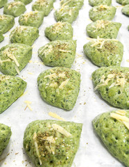 spinach bread with cheese on stencil paper, dressing with spice