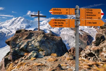 Papier Peint photo Cervin Signpost against mountains in Switzerland