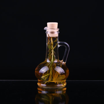 decanter with rosemary oil