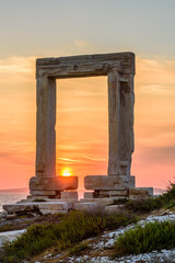 Portara - ruins of ancient temple of Delian Apollo on Naxos island, Cyclades archipelago, Greece. - obrazy, fototapety, plakaty