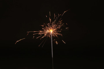 Christmas and new year party sparkler on black