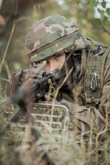 Soldier in camouflage © Photographee.eu