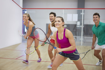 Affectionate friends during the squash game.