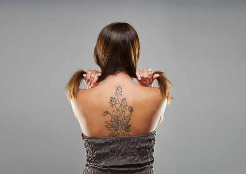 Tattoo woman portrait in studio shoot