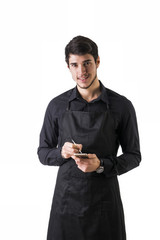 Full length shot of young chef or waiter posing isolated 