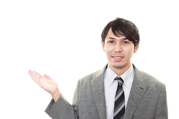 案内するビジネスマン