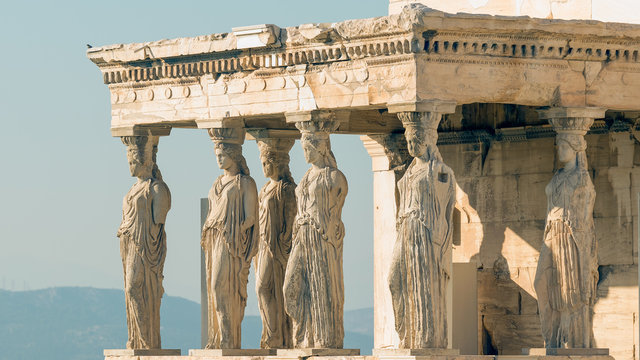 Caryatids at Acropolis in Greece against the sky.
