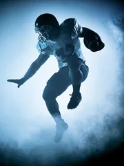 Fotobehang american football player silhouette © snaptitude
