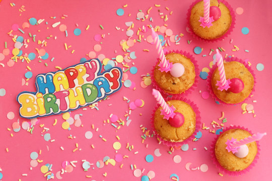 Cupcakes on pink background - happy birthday card 