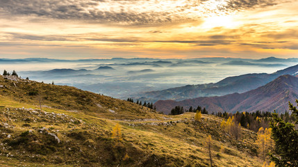 Fototapeta premium Sunset in the mountains. View of the valley