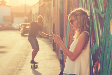Urban couple outdoors. © astrosystem