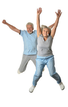 Senior couple jumping