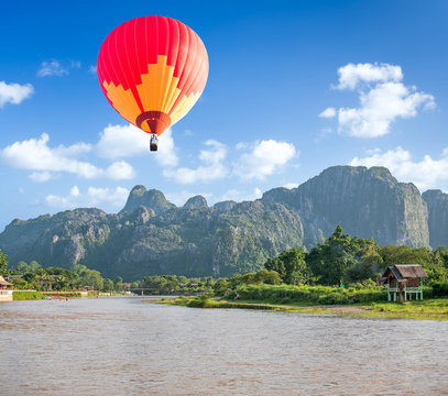 Hot air balloon over beautiful landscape of Vang Vieng,Laos