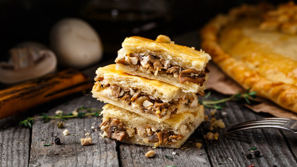 Homemade pie stuffed with mushrooms