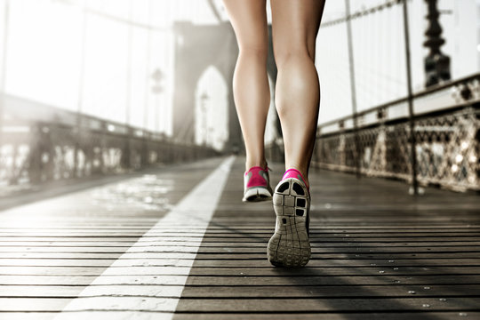 Female Runner on Brooklyn Bridge, NY