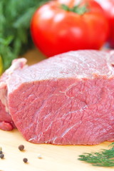 Fototapeta premium Raw meat with vegetables and spices