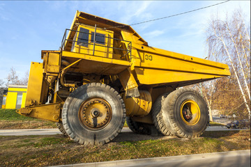 Obraz premium Bor, Serbia - December 08.2015: Yellow dumper truck 03