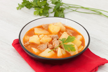 Delicious dish of cooked potatoes with meat