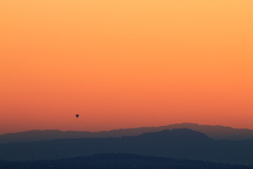 Balloon at sunset