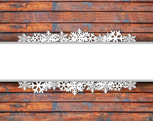 Christmas card background with snowflakes and wooden texture