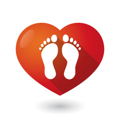 Isolated red heart with two footprints