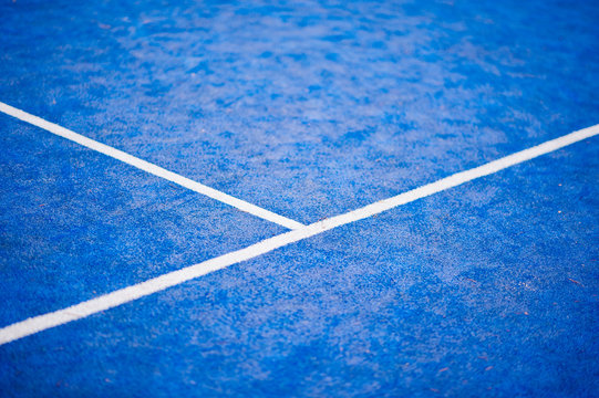 White line on blue soccer or football field