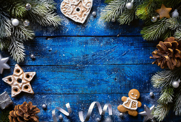 art Christmas background with christmas cookies and festive deco