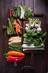 Fresh vegetables on cutting rustic boards