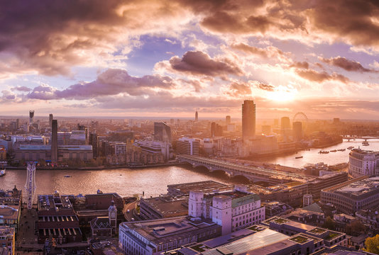 Panoramic skyline view of south and west London at sunset - UK