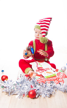 Baby boy dressed as elf