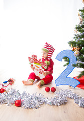 Baby boy dressed as elf