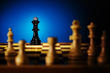Close up view of the chess on blue background