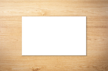 white blank name card on wooden background